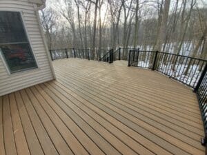 Do deck increase home value? For ROI purposes, yes, they can. A grand deck in an Ada, Michigan home.