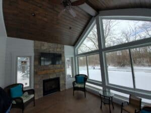 Sunroom full view Windows with Fireplace