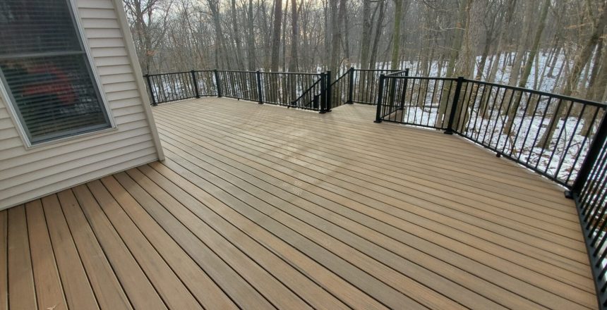 Do deck increase home value? For ROI purposes, yes, they can. A grand deck in an Ada, Michigan home.